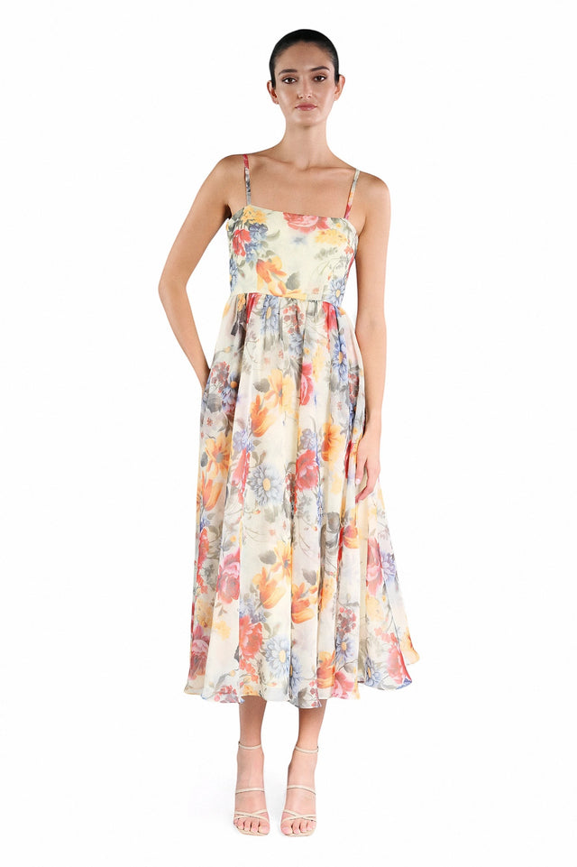 MSA Haute Couture floral print midi gown with spaghetti straps and a flowing skirt.