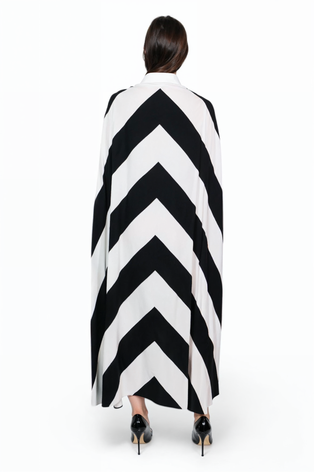 Valentino chevron cape dress, back view on model — black and white maxi with cape sleeves.