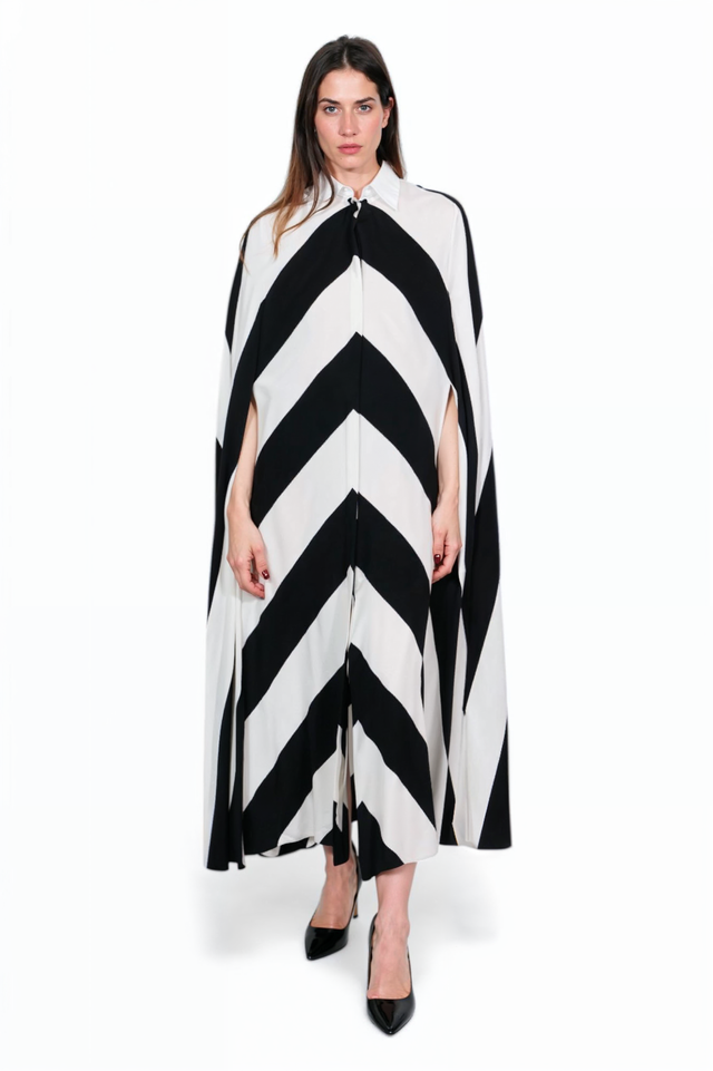Valentino chevron cape dress, front view on model — black and white maxi, tie-neck collar.