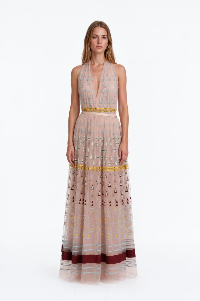 Valentino beige tulle halter gown with appliquéd geometric motifs and plunging neckline – front view