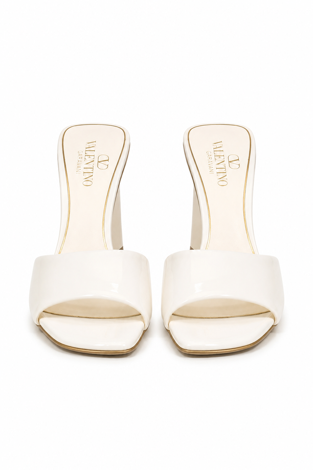Valentino Garavani Patent Leather Slide Sandals with Sculpted Heel in Ivory
