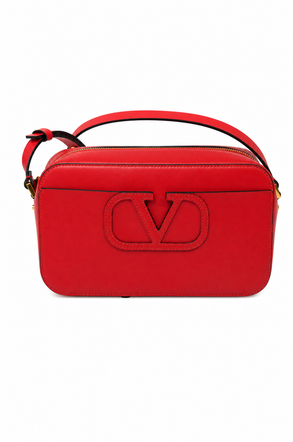 Valentino Garavani VLogo Escape leather camera crossbody bag in red calfskin with tonal VLogo patch and adjustable strap.