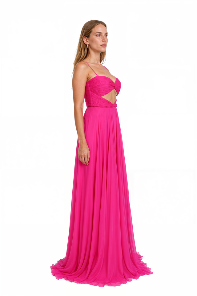 Three-quarter side view of Valentino fuchsia pink silk chiffon gown showing the full A-line skirt