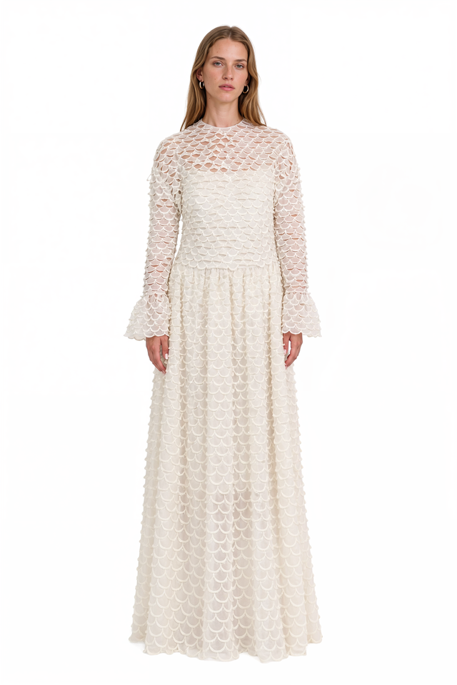 Front view of Valentino ivory scalloped lace maxi dress with high neckline and long bell-cuff sleeves