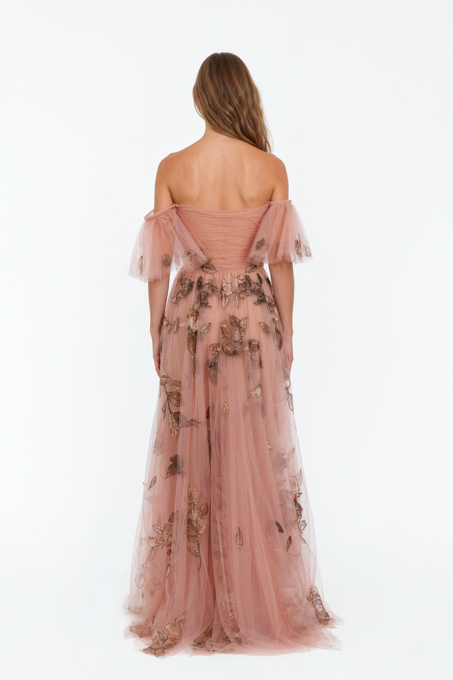 Back view of a Valentino pink metallic floral tulle gown with off-shoulder bodice and sweeping hem