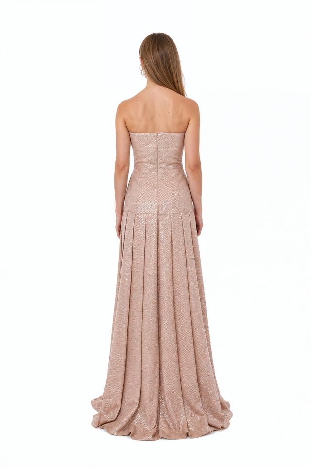 Back view of a Valentino blush sequin strapless gown with concealed zip and pleated sweeping skirt