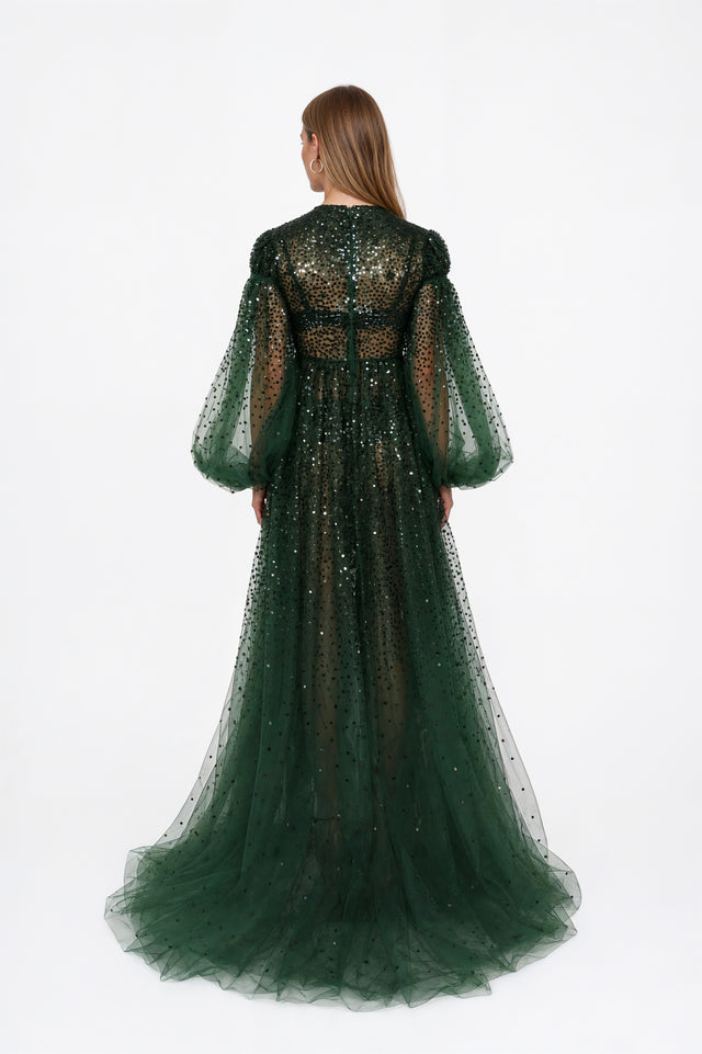 Back view of a Valentino bottle green sequin tulle gown with layered floor-length skirt