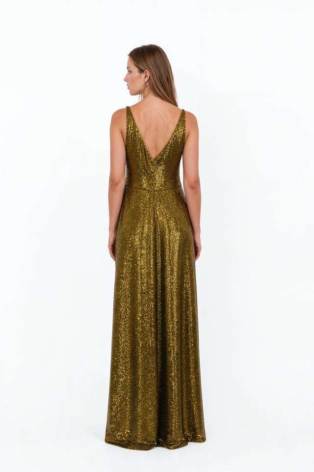 Back view of a Valentino bronze sequin slip gown with deep V-back and narrow straps