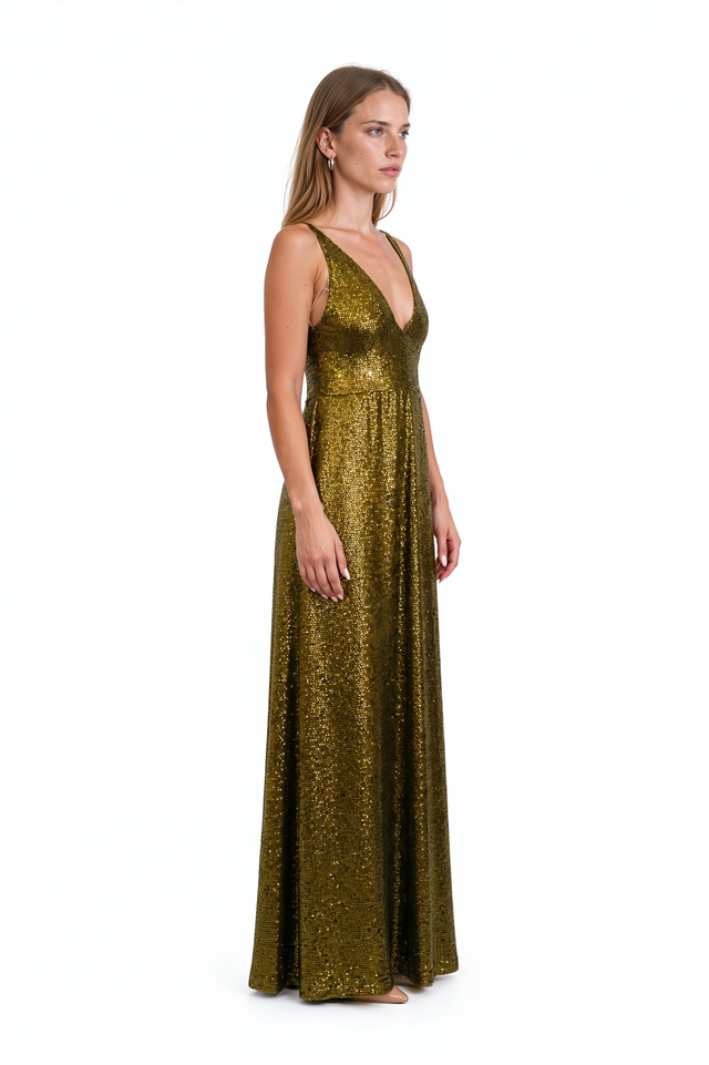 Side view of a Valentino bronze sequin gown showing the softly flared floor-length skirt