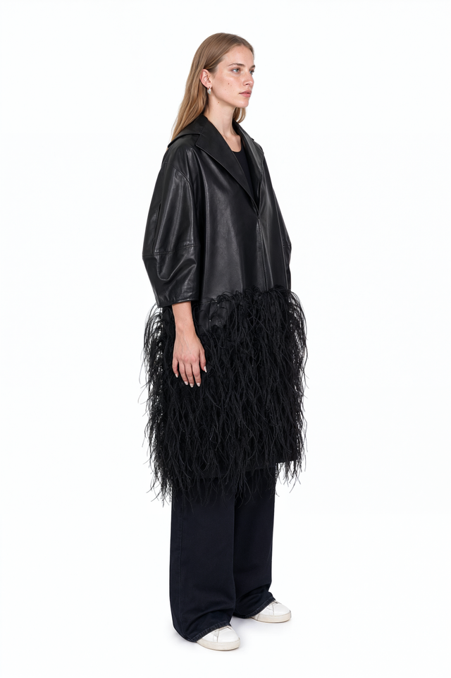 Side view of a Valentino black leather and feather overlay coat