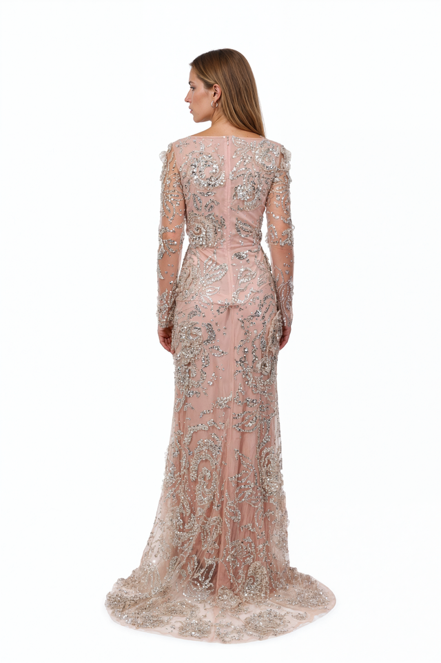 Back view of a Valentino blush beaded tulle gown with concealed zip and beaded trailing hem