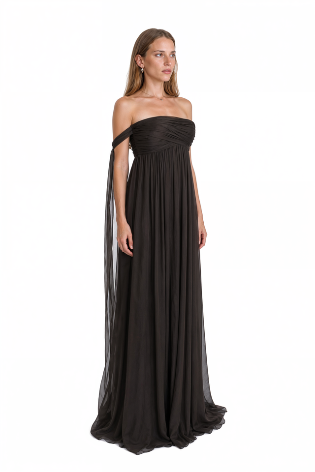 Side view of a Valentino black chiffon empire gown with sheer cape sleeves