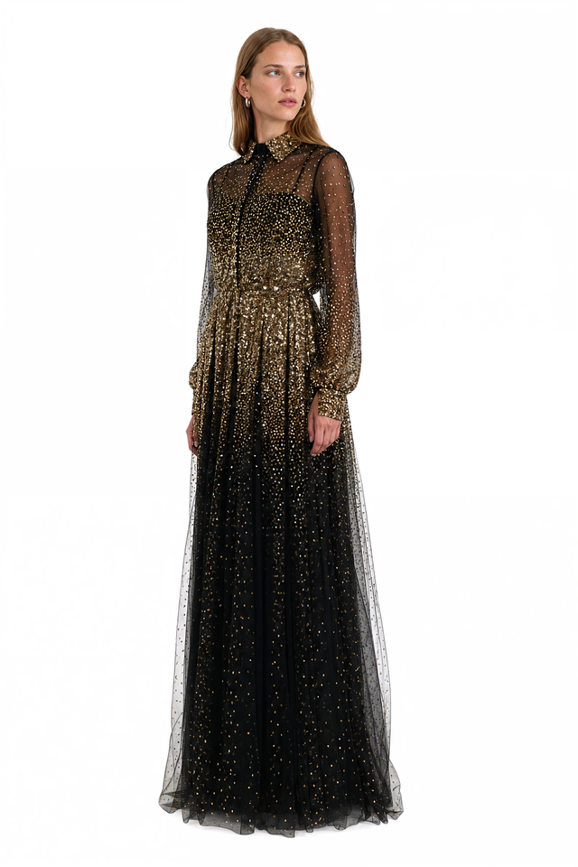 Three-quarter view of Valentino black and gold sequin tulle gown showing the full A-line skirt