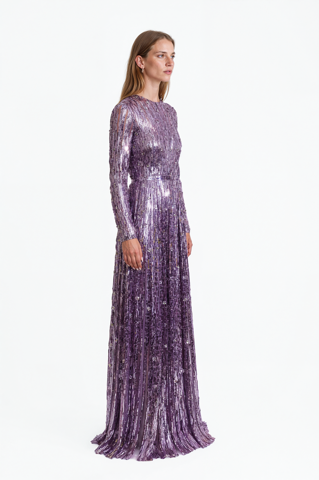 Side view of a Valentino purple sequin stripe tulle gown with pleated floor-length skirt