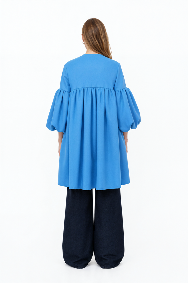 Back view of a Valentino blue balloon sleeve swing coat