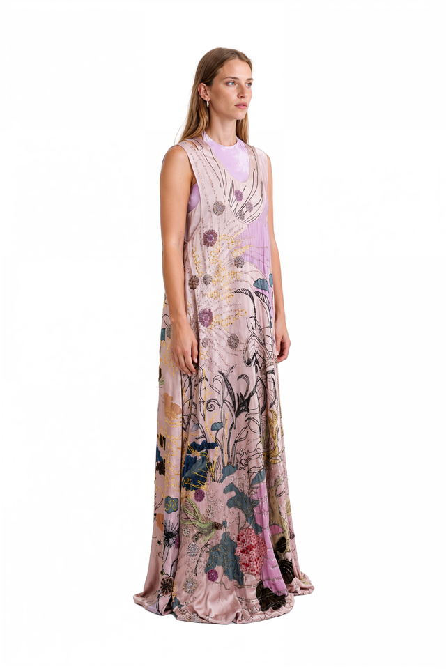 Side view of a Valentino pink embellished reef-motif gown