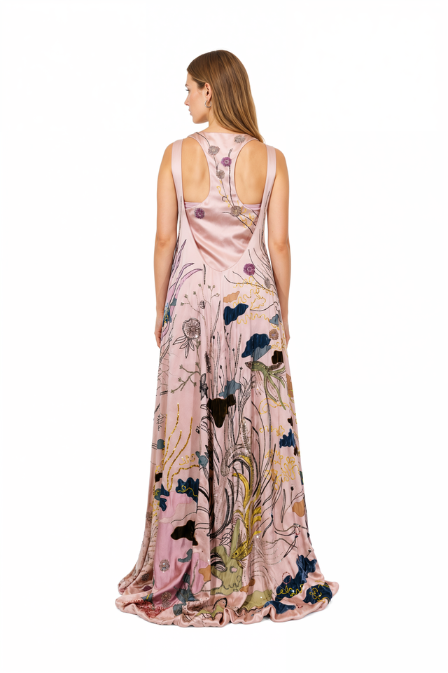 Back view of a Valentino blush embellished sleeveless gown