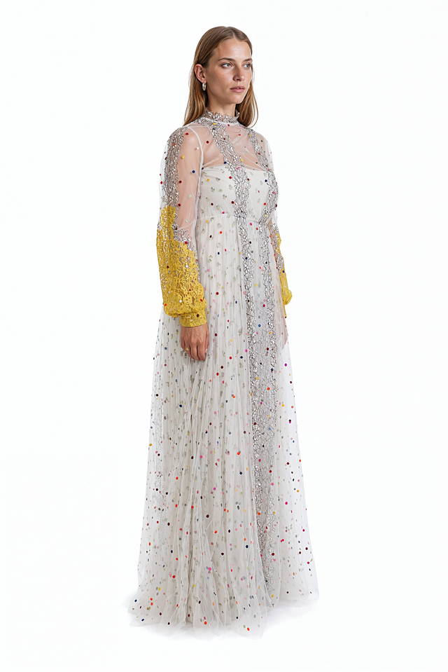 Valentino off-white sheer tulle gown with multi-color sequin polka dots, yellow lace cuffs and silver lace panels