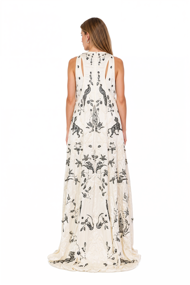 Back view of a Valentino ivory embroidered gown with sweeping hem