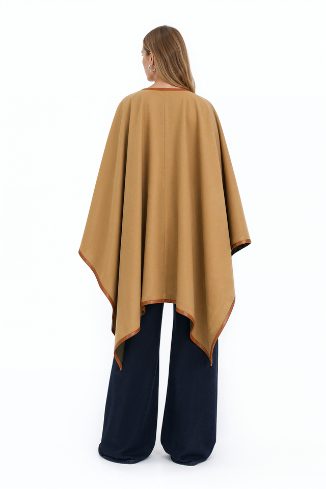 Back view of a Valentino camel wool cape with leather-bound edges