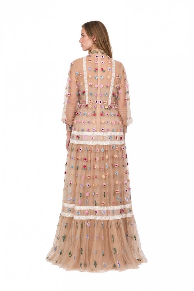 Back view of a Valentino floral appliqué tulle gown with lace insert bands