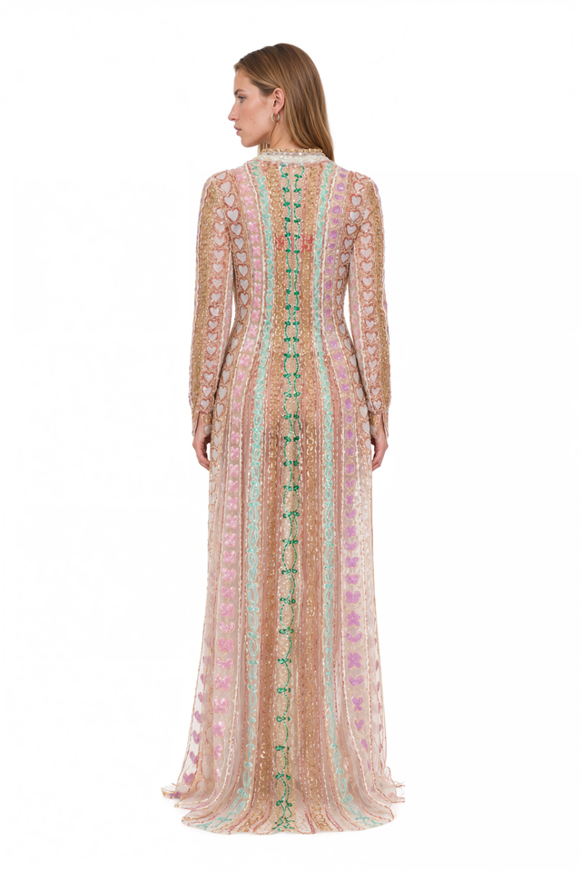 Back view of a Valentino ivory embroidered sheer shirt gown