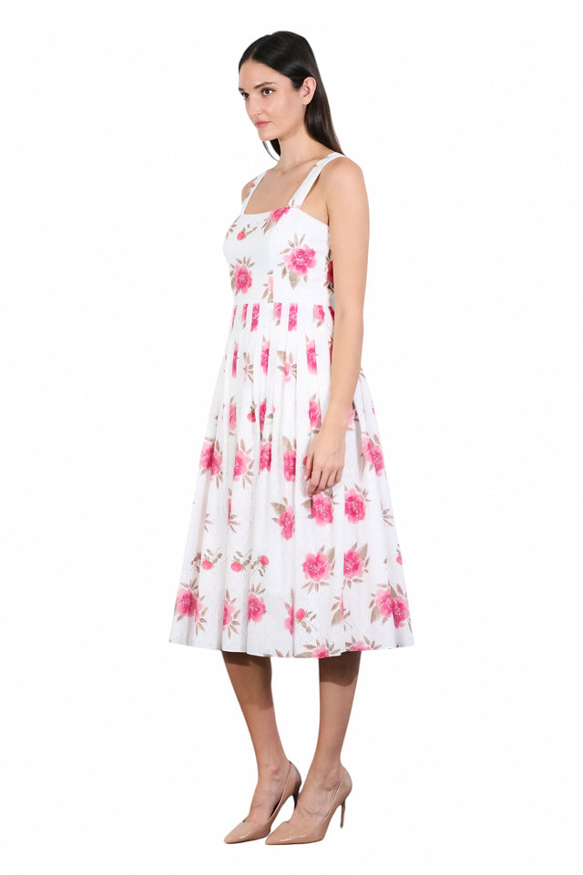 MSA Haute Couture white midi dress with pink floral print, square neck, and pleated bodice.