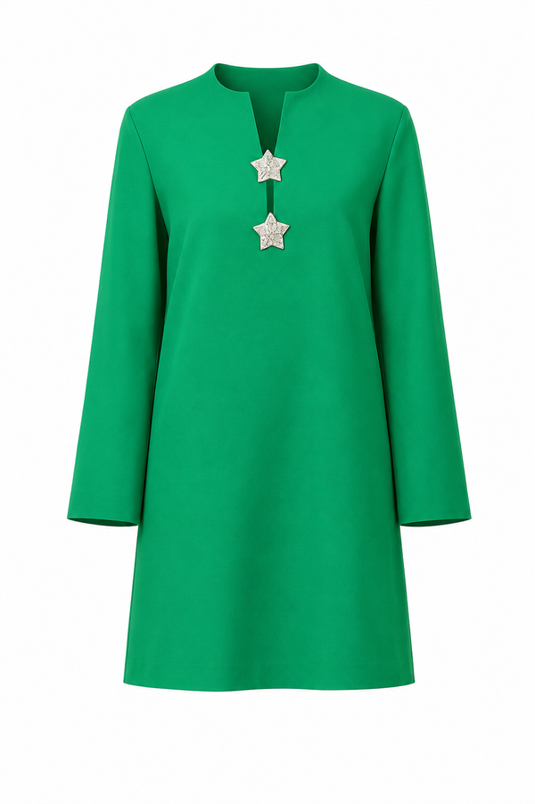 Green Valentino dress with star-shaped buttons on a white background