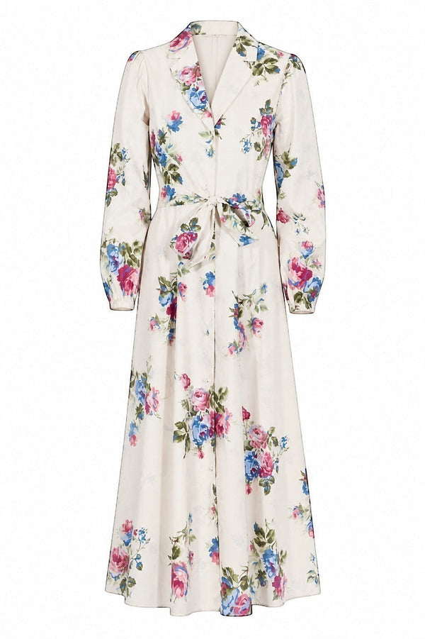 MSA Haute Couture cream midi dress with a multicolor floral print, shirt collar, long sleeves, and waist tie.
