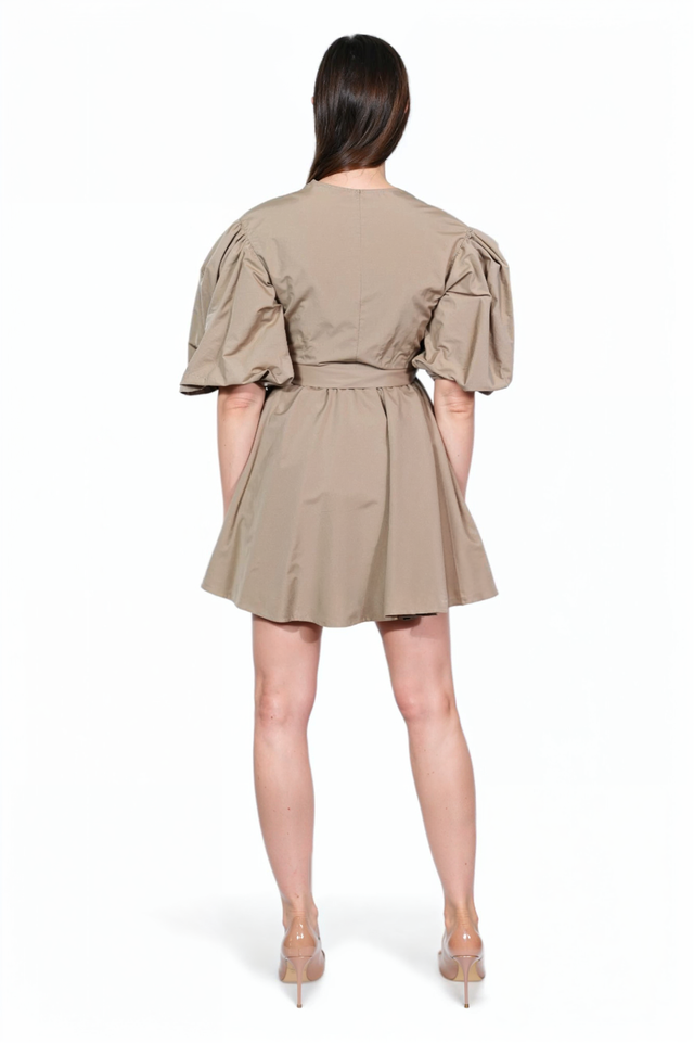 Valentino taupe wrap mini dress, back view on model — short flared skirt and puff sleeve detail.