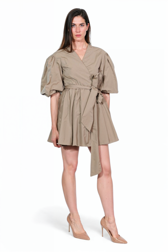 Valentino taupe mini dress, side view on model — wrap design with belted waist and voluminous sleeves.