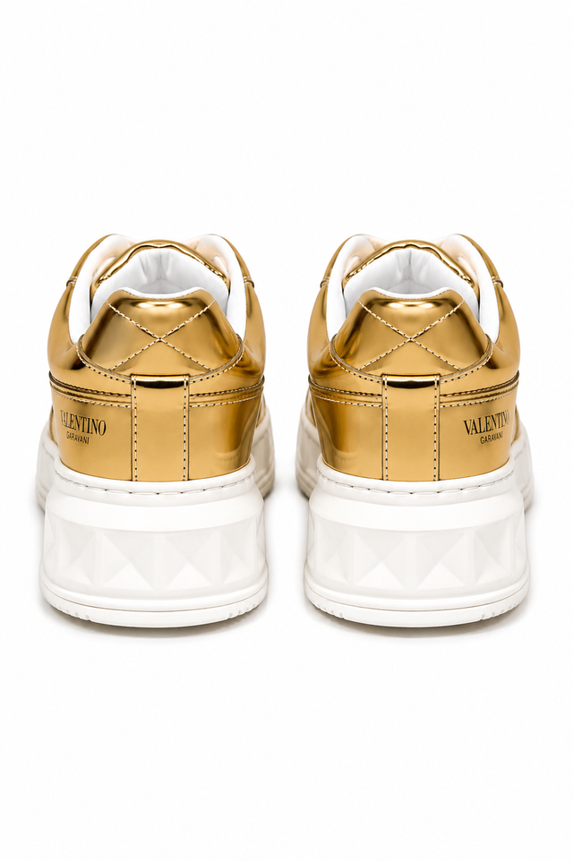 Valentino Garavani Rockstud Metallic Leather Platform Sneakers in Gold